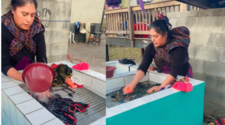 Orgullosa madre guatemalteca lava su ropa a mano en EEUU